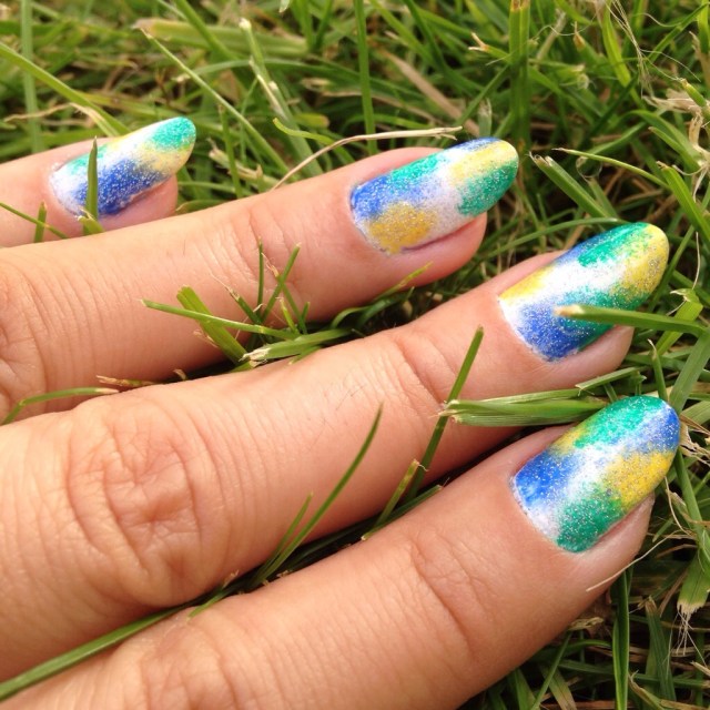 Green, yellow, blue and white "tie-dye" effect nails - somanylovelythings