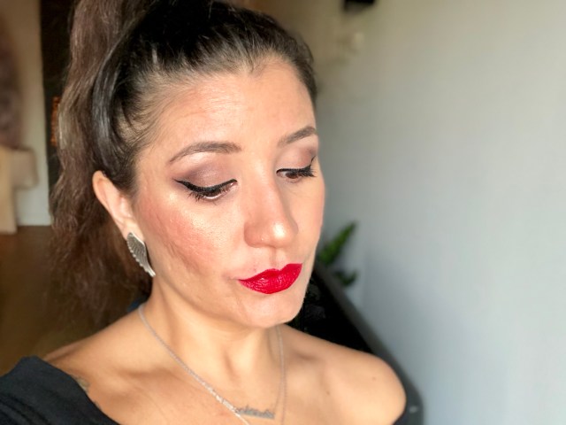 I Heart Revolution Dragon's Blood Highlighter on face